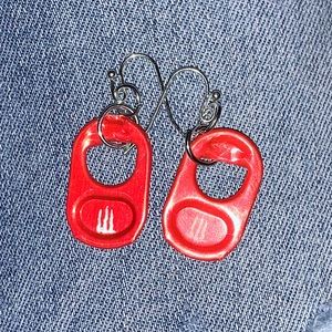 red monster tab ear rings. dangly